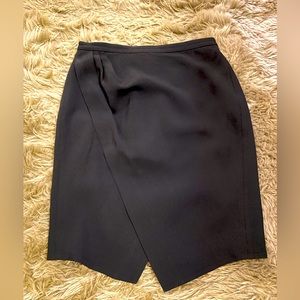 Black J Crew skirt. Asymmetrical hem, size 8P, of their 365 fabric line.